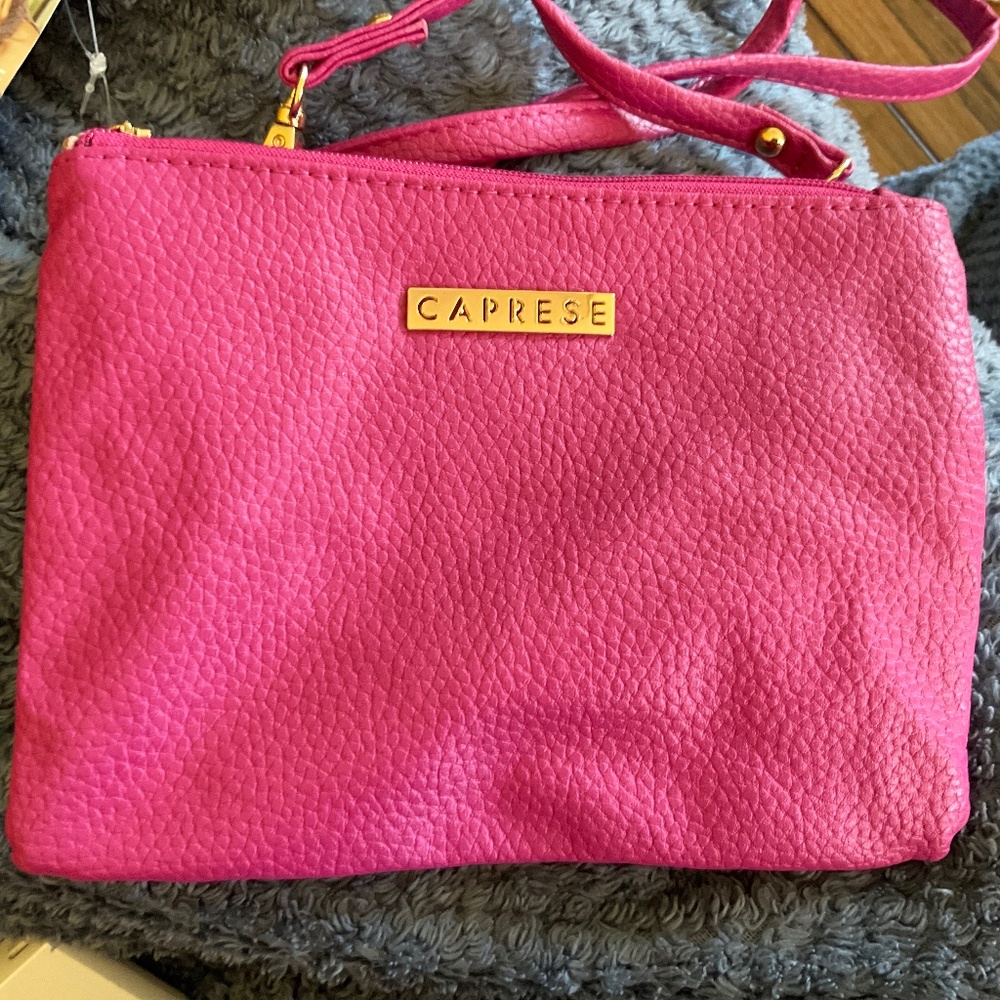 Magenta Caprese shoulder purse with tags